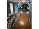 Upstairs hallway with hardwood floors and nice railing, lots of space at 71 Southern Golf Ct, Fayetteville, GA 30215