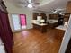 Eat-in kitchen with hardwood floors, a center island, and ample cabinet space at 71 Southern Golf Ct, Fayetteville, GA 30215