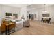 Open concept living room with hardwood floors, a dining area, and modern finishes throughout at 974 Clydesdale Dr, Marietta, GA 30062