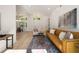 Stylish living room featuring bright hardwood floors, a pitched ceiling, and an open floor plan at 974 Clydesdale Dr, Marietta, GA 30062