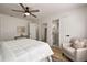 Bright main bedroom features ceiling fan, closet, and ensuite bathroom at 974 Clydesdale Dr, Marietta, GA 30062