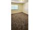 Bright bedroom featuring new carpet, a window, and a neutral color palette at 1225 Church St # G, Decatur, GA 30030