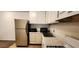 Efficient kitchen design with white cabinets, modern appliances, and durable countertops at 1225 Church St # G, Decatur, GA 30030