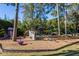 Colorful playground features swings, slides, and climbing structures, perfect for Gathering fun at 1225 Church St # G, Decatur, GA 30030