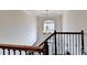 Grand foyer with a chandelier and staircase at 189 Azalea Chase Dr, Suwanee, GA 30024