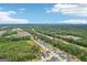 Neighborhood aerial view with green space, street, and a view of the overall community at 247 Widener Way, Peachtree City, GA 30269
