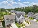 Beautiful aerial view of a Gathering-friendly neighborhood with well-manicured lawns and tree-lined streets at 247 Widener Way, Peachtree City, GA 30269