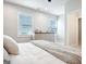 Bright bedroom with two twin beds and natural light from a window at 247 Widener Way, Peachtree City, GA 30269