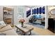 Well-lit flex room with natural light, desk, and shelving offers versatile space at 247 Widener Way, Peachtree City, GA 30269