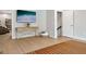 Entry area featuring hardwood floors, a console table, and a cozy seating area at 247 Widener Way, Peachtree City, GA 30269