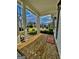 Charming front porch featuring brick flooring, classic columns, and ample natural light at 247 Widener Way, Peachtree City, GA 30269