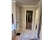 Nicely appointed bathroom featuring a shower, toilet, and large closet at 3675 Brookhollow Dr, Douglasville, GA 30135
