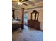 Well-lit bedroom with a distinctive canopy bed and complementary dresser at 3675 Brookhollow Dr, Douglasville, GA 30135