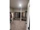 Spacious walk-in closet with carpeting and clothing racks for ample storage at 3675 Brookhollow Dr, Douglasville, GA 30135