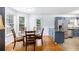 Bright dining area with hardwood floors, stainless steel appliances, and plenty of natural light at 1902 Seals Rd, Dallas, GA 30157