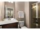 Neutral bathroom with a framed shower, white bath towels and an open door leading to another room at 2305 Limehurst Ne Dr # 21, Atlanta, GA 30319