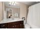 Bathroom with double sinks, framed mirrors, and shower/tub combo at 2305 Limehurst Ne Dr # 21, Atlanta, GA 30319