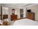 Bedroom with a doorway to the bathroom and a doorway to the upstairs hallway at 2305 Limehurst Ne Dr # 21, Atlanta, GA 30319