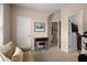 Relaxing bonus room with comfortable sofa, neutral color palette, and access to the upstairs hall at 2305 Limehurst Ne Dr # 21, Atlanta, GA 30319