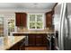 Lovely kitchen with granite countertops, stainless appliances, and an abundance of natural light at 2305 Limehurst Ne Dr # 21, Atlanta, GA 30319