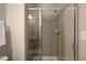 Framed shower with mosaic tile and adjustable shower head, showcasing simple elegance at 2305 Limehurst Ne Dr # 21, Atlanta, GA 30319