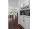 Butlers pantry with wine storage and coffee machine area at 5755 Riley Rd, Cumming, GA 30028