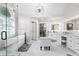 Elegant bathroom with a freestanding tub, walk-in shower, and vanity with ample storage and countertop space at 5755 Riley Rd, Cumming, GA 30028