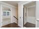 View of an elevator, situated near a hallway and an open room at 5755 Riley Rd, Cumming, GA 30028