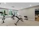 Home gym with workout equipment and windows for natural light at 5755 Riley Rd, Cumming, GA 30028