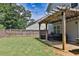 Well maintained backyard with patio and pergola at 137 Prominence Ct, Canton, GA 30114