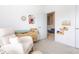 Charming Bedroom with rocking chair and built in bookshelf at 137 Prominence Ct, Canton, GA 30114