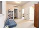 Spacious bonus room featuring a large bookcase and lots of natural light at 137 Prominence Ct, Canton, GA 30114