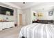 Spacious main bedroom featuring sitting area, TV, and ensuite bathroom at 137 Prominence Ct, Canton, GA 30114