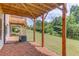 Spacious backyard featuring a lush lawn and view of the deck above, perfect for outdoor enjoyment at 2005 Hamilton Creek Pkwy, Dacula, GA 30019