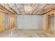 Unfinished basement featuring open layout, exposed ceiling and wooden framing, ready for customization at 2005 Hamilton Creek Pkwy, Dacula, GA 30019