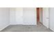 Bedroom with neutral walls and neutral carpet at 2005 Hamilton Creek Pkwy, Dacula, GA 30019