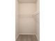 Empty closet with carpet and metal shelving at 2005 Hamilton Creek Pkwy, Dacula, GA 30019