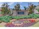 Attractive Creekside at Hamilton Mill community sign with colorful landscaping and well-maintained shrubs at 2005 Hamilton Creek Pkwy, Dacula, GA 30019