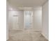 Bright hallway with plush carpeting and ample recessed lighting throughout at 2005 Hamilton Creek Pkwy, Dacula, GA 30019