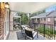Relaxing balcony with seating, offering a view of the green surroundings and community at 3675 Peachtree Ne Rd # 24, Atlanta, GA 30319