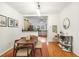 This dining room features hardwood floors and an open concept layout at 3675 Peachtree Ne Rd # 24, Atlanta, GA 30319