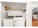 The laundry room includes a washer, dryer, and extra storage space at 3675 Peachtree Ne Rd # 24, Atlanta, GA 30319