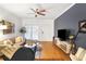 Bright and airy living room with hardwood floors, stylish furnishings, and open floor plan at 3675 Peachtree Ne Rd # 24, Atlanta, GA 30319