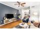 Stylish living room with hardwood floors, comfortable seating, and a modern entertainment center at 3675 Peachtree Ne Rd # 24, Atlanta, GA 30319
