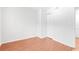 Cozy bedroom with neutral tones, hardwood floors and closet at 1308 Camelot Dr, Atlanta, GA 30349
