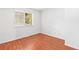 Inviting bedroom with ample natural light, hardwood floors and a soothing atmosphere at 1308 Camelot Dr, Atlanta, GA 30349