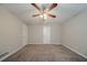 Bright, airy bedroom with neutral walls, carpet flooring, and overhead lighting at 2233 Cherokee Valley Dr, Lithonia, GA 30058