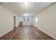 Spacious living area with stairs to another level, wood-look flooring and neutral tones at 2233 Cherokee Valley Dr, Lithonia, GA 30058