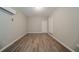 Flex room offering wood-look flooring, neutral paint, and in-wall air conditioning at 2233 Cherokee Valley Dr, Lithonia, GA 30058