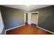 Comfortable bedroom featuring hardwood floors and closet space at 3873 Jane Marie Ln, Decatur, GA 30035